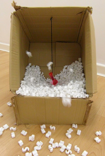 Cardboard box, styrofoam and battery fan