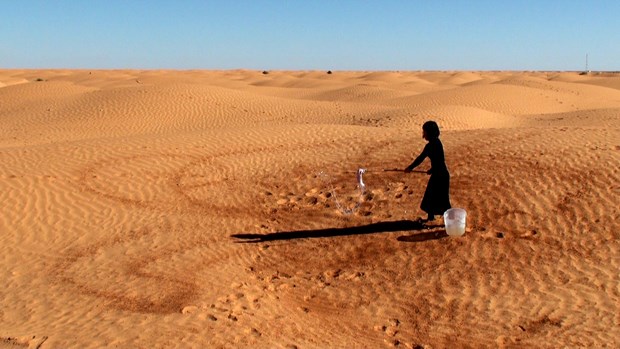 Splashing Water on the Sahara Desert